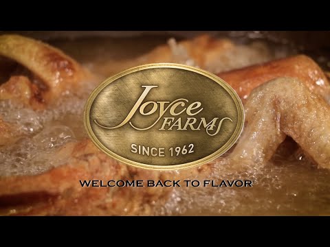 Cooking demonstration video showing the preparation of an 8-piece fried chicken entrée using Joyce Farms Poulet Rouge® Heritage Chicken. The video includes a caution about the dangers of hot oil and open flames and highlights the chicken's quality, being pasture-raised, antibiotic-free, and fed an all-vegetable diet, with a GAP Step 4 certification for animal welfare.