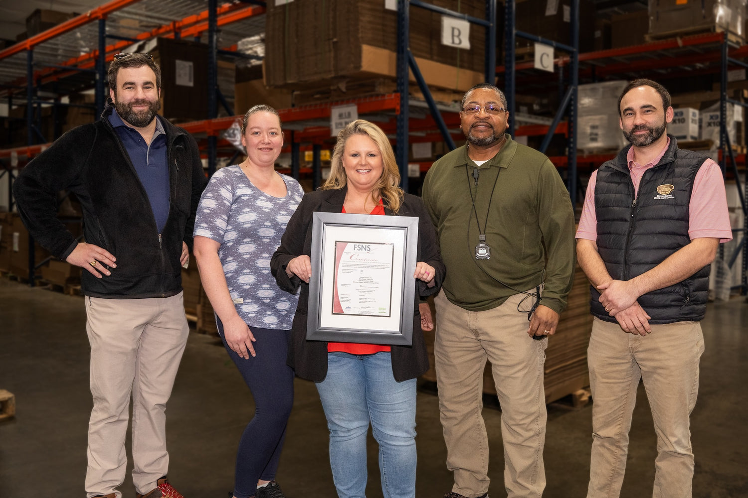 Joyce Farms team celebrating BRC AA+ Food Safety Rating in latest audit.