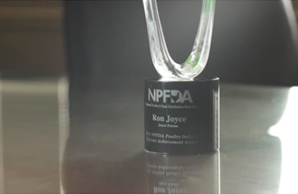 National Protein and Food Distributors Association (NPFDA) Lifetime Achievement Award on office desk