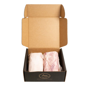 Open case of two vacuum sealed Joyce Farms Heritage Pork Sirloin End Loins