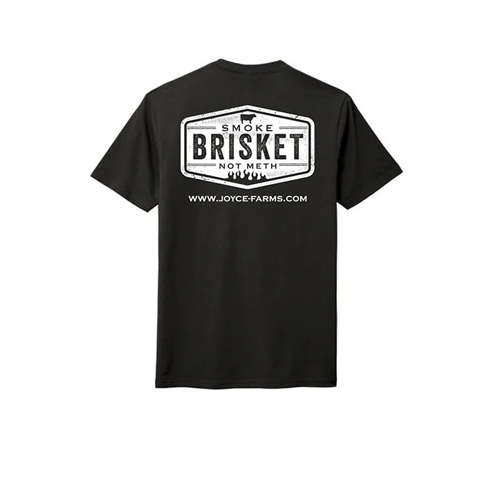 A black t-shirt with a large white graphic on the back reading "Smoke Brisket Not Meth," with the Joyce Farms website URL below the text.