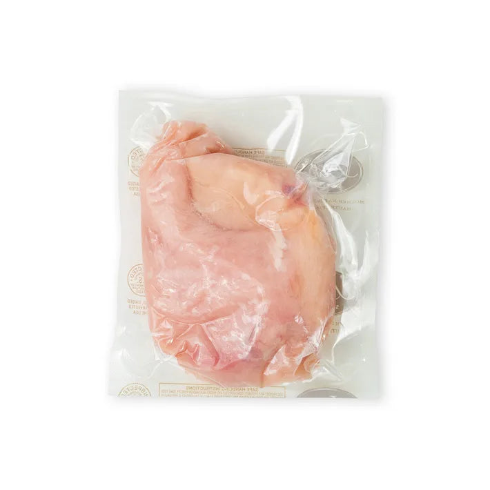 Vacuum-sealed raw Poulet Rouge® Boneless Skinless Chicken Breast from Joyce Farms, a heritage breed known for its slow-growing, pasture-raised, and air-chilled process. Rich in flavor.