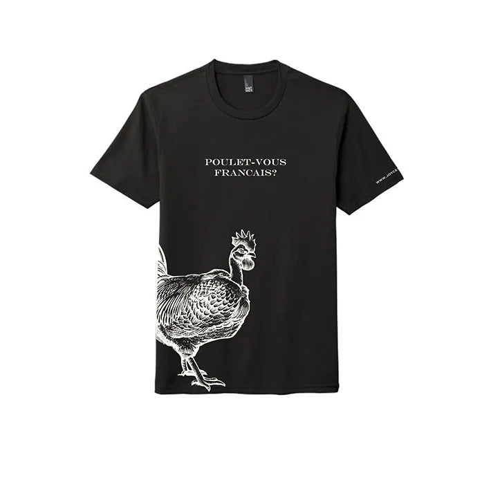Front view of a black t-shirt with the text "POULET-VOUS FRANÇAIS?" in the center. The shirt also has a detailed white line illustration of a Joyce FArms Poulet Rouge® Heritage chicken, with the chicken's body and head extending from the bottom left side.