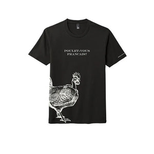 Front view of a black t-shirt with the text "POULET-VOUS FRANÇAIS?" in the center. The shirt also has a detailed white line illustration of a Joyce FArms Poulet Rouge® Heritage chicken, with the chicken's body and head extending from the bottom left side.