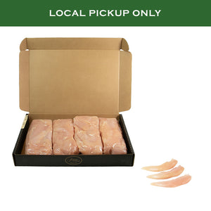 Open box of Joyce Farms Naked Chicken Tenders, with the bulk package marked 'LOCAL PICKUP ONLY.' Individual raw tenders are also displayed beside the box for a detailed view of the product.